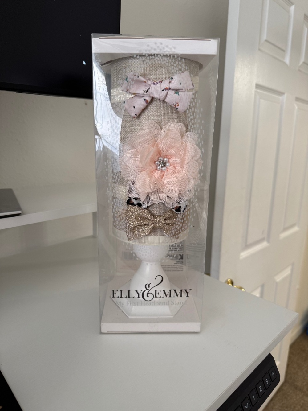 Elly and Emmy Headband stand. Comes with *4 headbands*.
